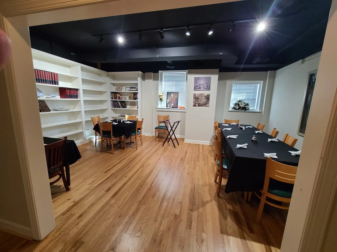 Tables set for guests in the private dining room