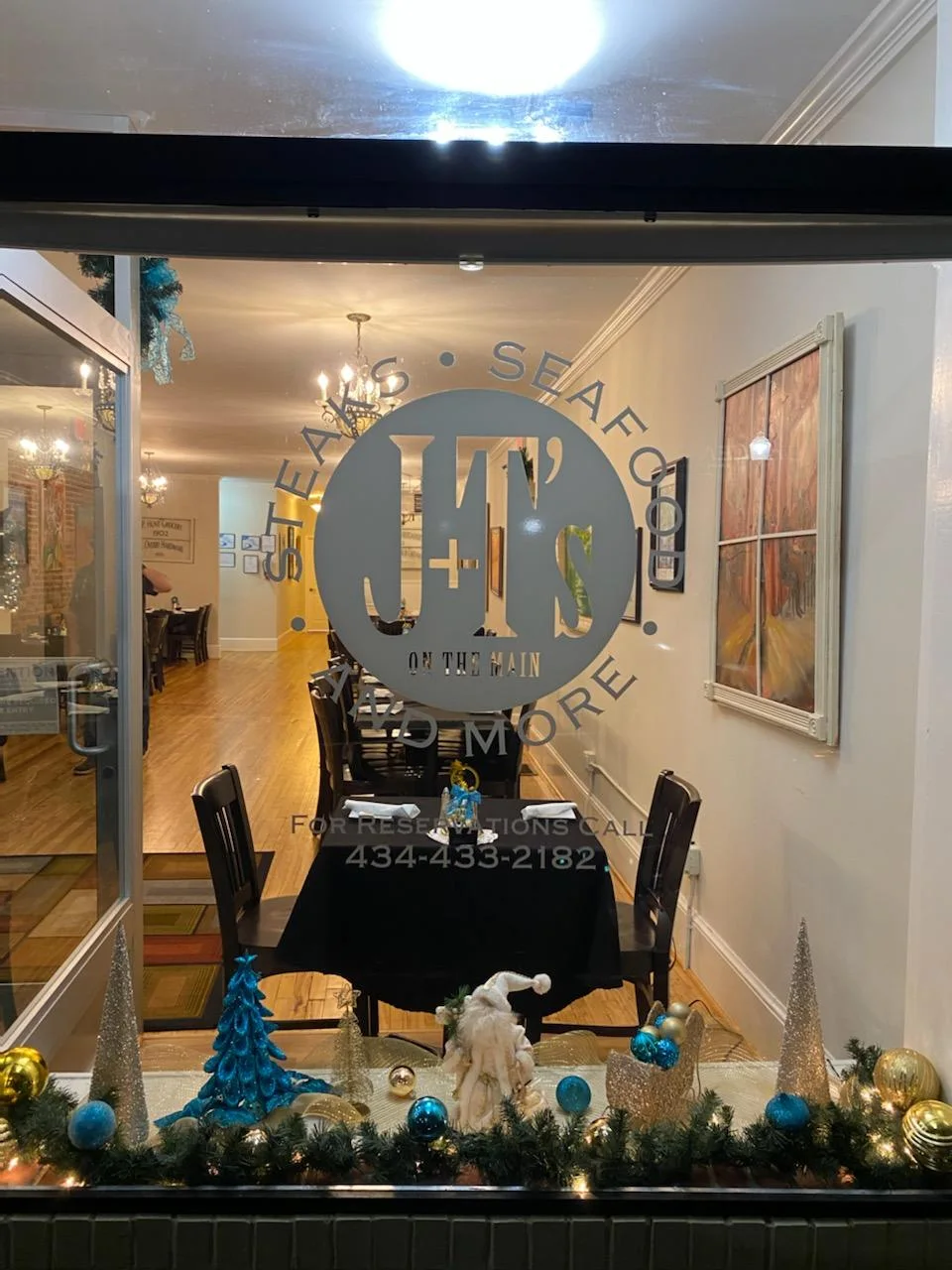 The J+T's on the Main name on the restaurant's front window